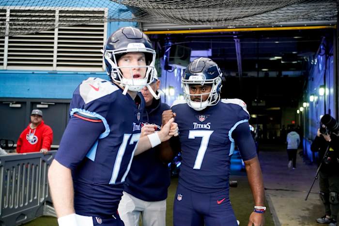 Tennessee Titans quarterbacks Ryan Tannehill (17) and Malik Willis (7) head to the field as the team gets ready to face the Jacksonville Jaguars at Nissan Stadium Sunday, Dec. 11, 2022, in Nashville, Tenn.